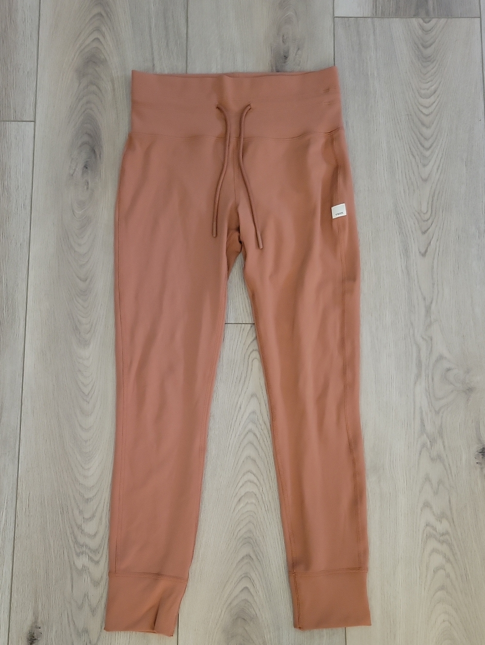 Vuori Women's High-Rise Leggings in Rust